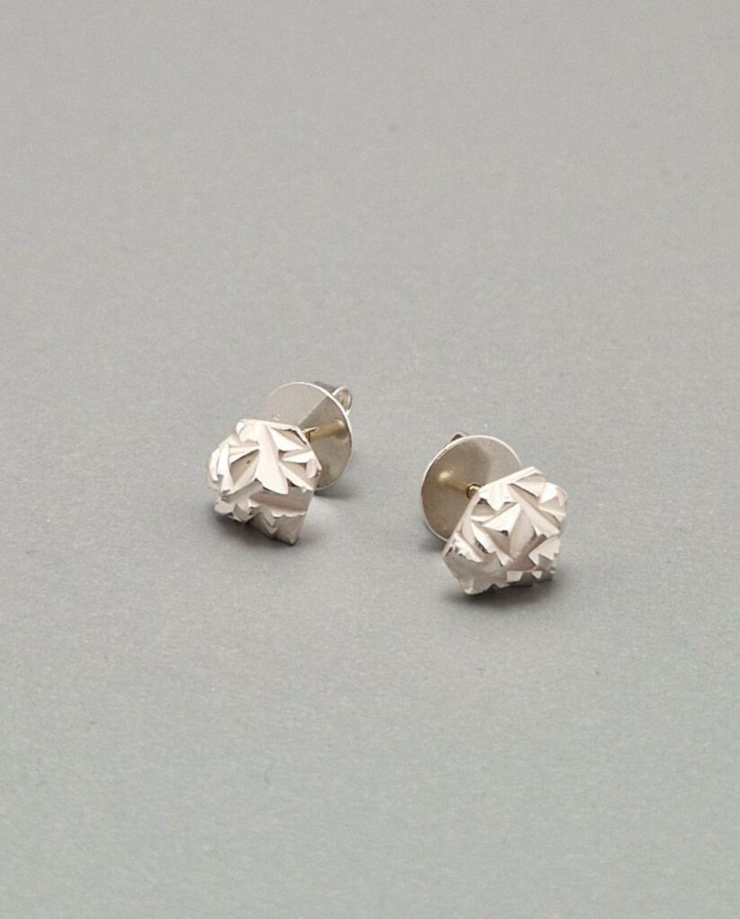 the rock 21 century Ohrstecker Silber